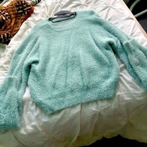 The beautiful sweater is perfect in the winter